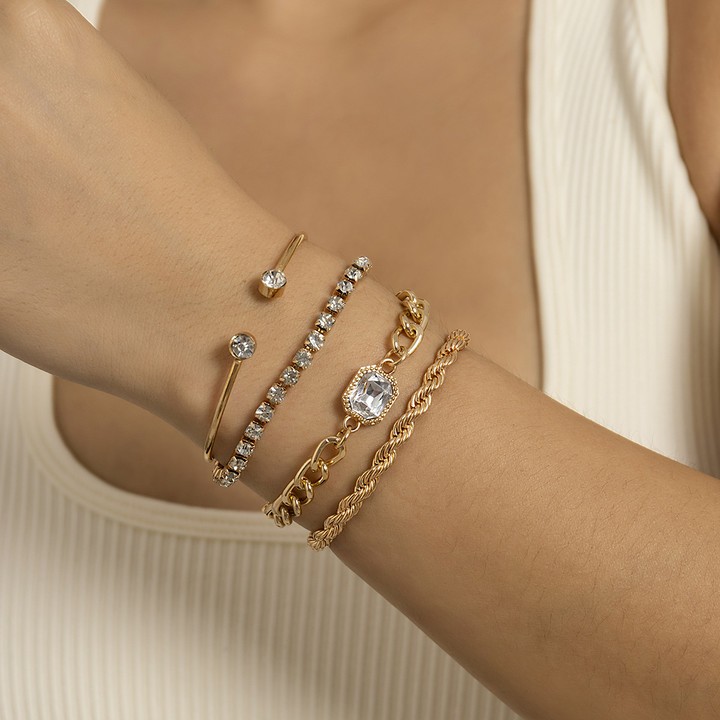 "Monolithic gold brilliance: a collection of elegant bracelets with a modern twist