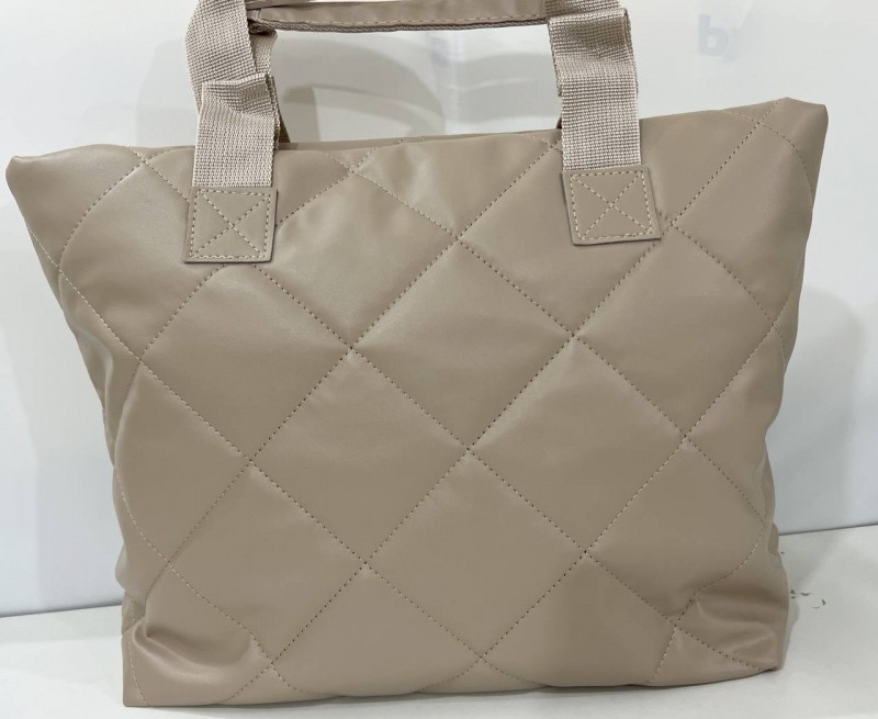 "The elegance of the quilted beige