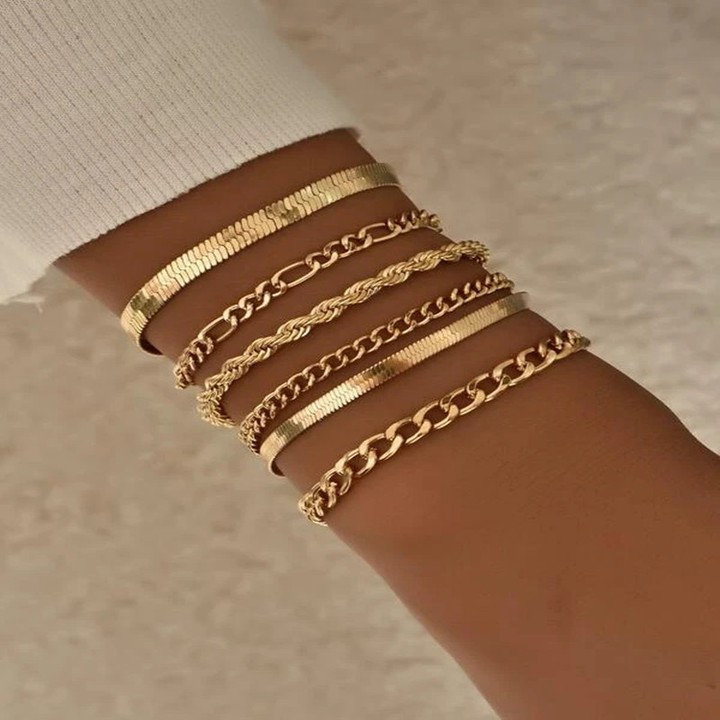 : Stacked gold bracelets - a touch of brilliance for every day