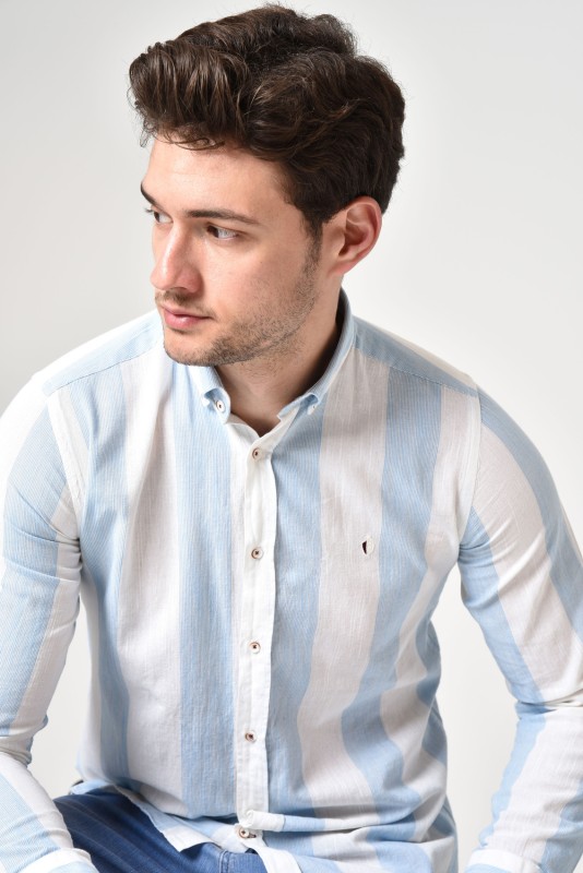 "Shine with a fresh summer look with this light blue striped shirt."